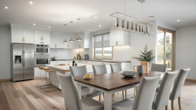 dining room featuring recessed lighting and light wood-type flooring