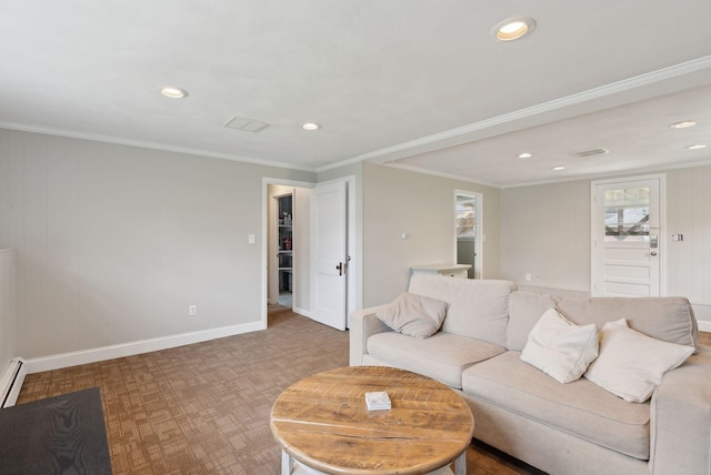 living room with crown molding, baseboards, and recessed lighting