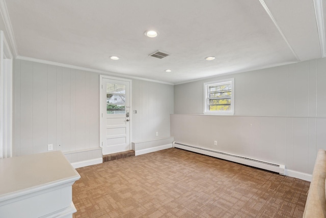 spare room featuring plenty of natural light, visible vents, baseboard heating, and recessed lighting