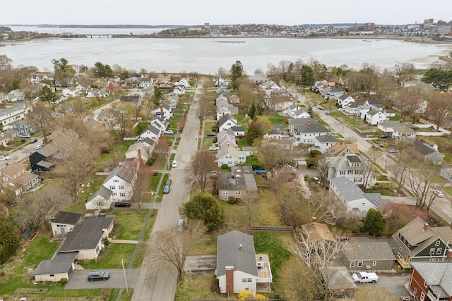 bird's eye view with a water view and a residential view