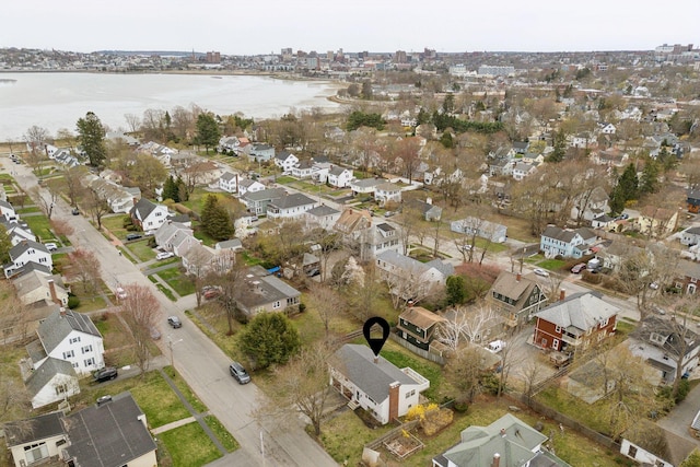 aerial view with a water view and a residential view
