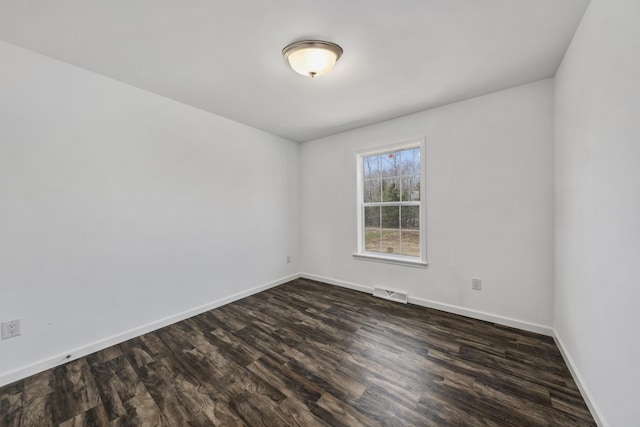 255 Cushing Rd, Cushing, ME 04863 - empty room featuring dark wood-style flooring and baseboards