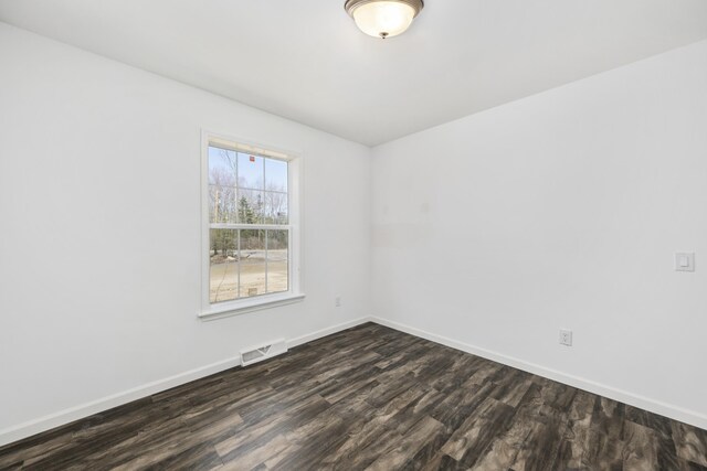 255 Cushing Rd, Cushing, ME 04863 - unfurnished room featuring dark wood-style floors and baseboards