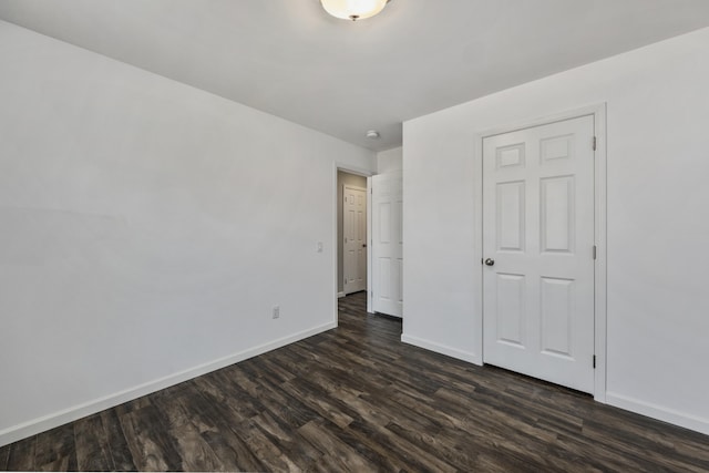 255 Cushing Rd, Cushing, ME 04863 - unfurnished bedroom featuring dark wood finished floors and baseboards