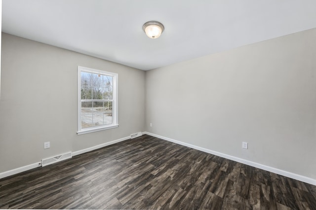 255 Cushing Rd, Cushing, ME 04863 - empty room featuring dark wood finished floors and baseboards