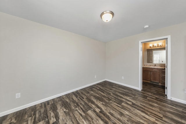 255 Cushing Rd, Cushing, ME 04863 - spare room featuring dark wood-style flooring, baseboards, and a smoke detector