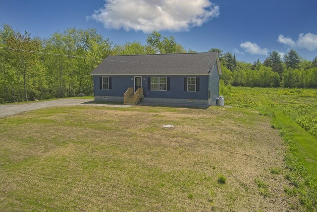 255 Cushing Rd, Cushing, ME 04863 - manufactured / mobile home featuring a front lawn and driveway