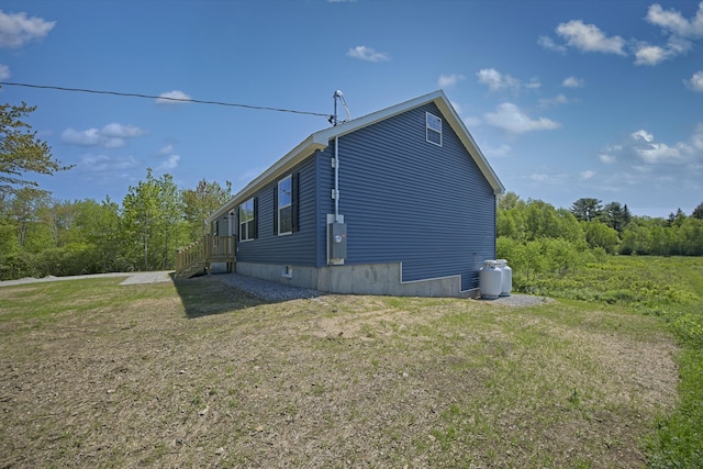 255 Cushing Rd, Cushing, ME 04863 - view of home's exterior with a yard