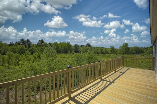 255 Cushing Rd, Cushing, ME 04863 - wooden deck featuring a view of trees