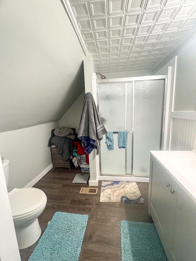 6 Hudson St, Bangor, ME 04401 - full bathroom featuring toilet, wood finished floors, a shower stall, and an ornate ceiling