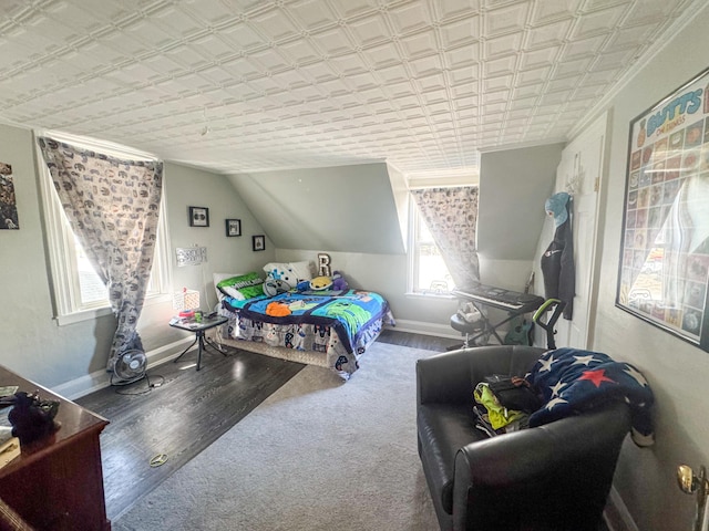 6 Hudson St, Bangor, ME 04401 - carpeted bedroom with wood finished floors, vaulted ceiling, baseboards, and an ornate ceiling