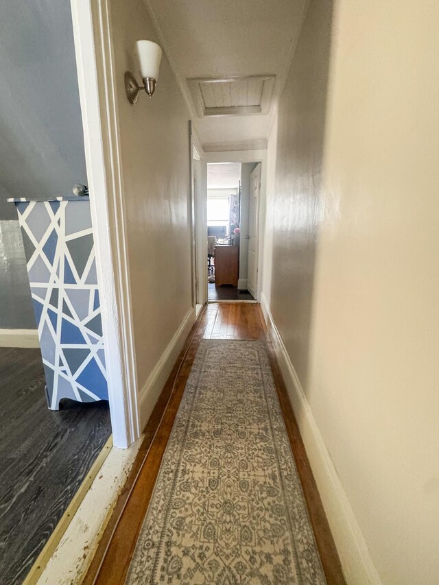 6 Hudson St, Bangor, ME 04401 - hall featuring baseboards, attic access, and wood-type flooring