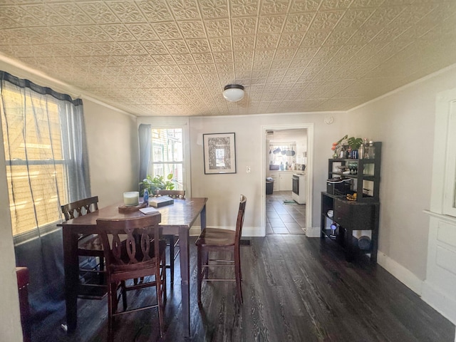 6 Hudson St, Bangor, ME 04401 - dining area featuring crown molding, dark wood-style flooring, baseboards, and an ornate ceiling