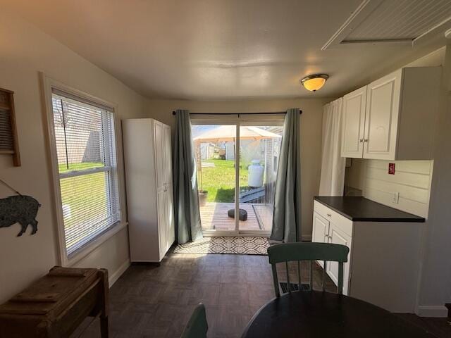 7 Johnson St, Eastport, ME 04631 - doorway to outside featuring baseboards