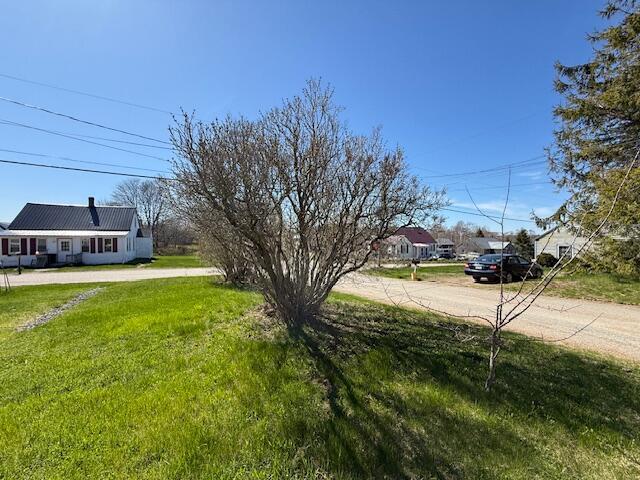 7 Johnson St, Eastport, ME 04631 - view of yard with concrete driveway