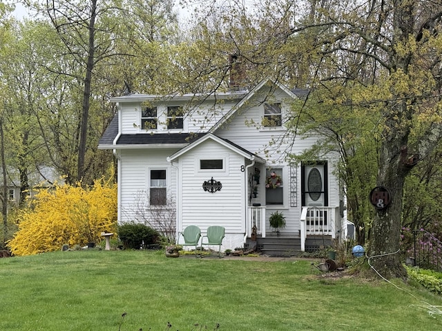 8 Organug Rd, York, ME 03909 - view of front of home featuring a chimney and a front yard