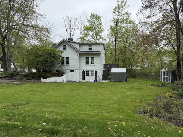 8 Organug Rd, York, ME 03909 - rear view of property with a chimney and a yard