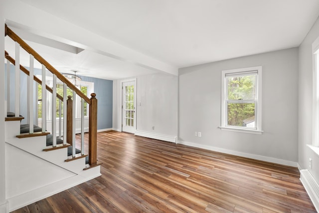 8 Organug Rd, York, ME 03909 - empty room with a chandelier, stairs, and healthy amount of natural light