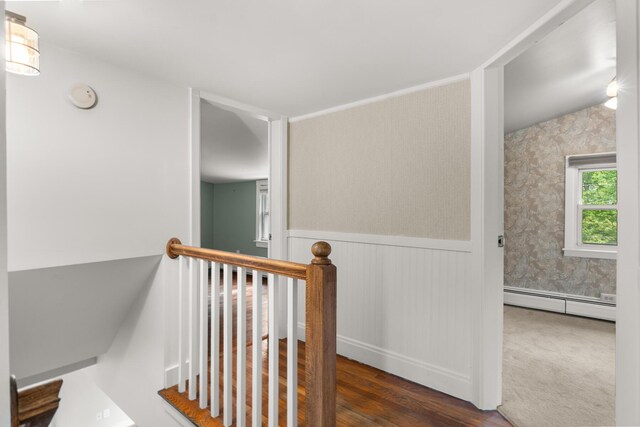8 Organug Rd, York, ME 03909 - hallway with baseboard heating, an upstairs landing, wainscoting, and wood finished floors