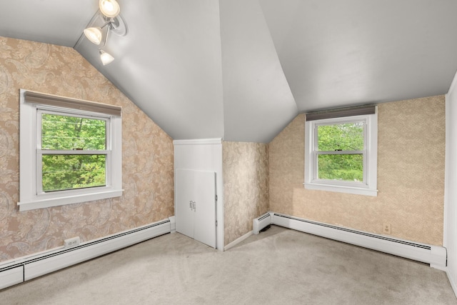 8 Organug Rd, York, ME 03909 - additional living space with a baseboard radiator, lofted ceiling, carpet floors, and wallpapered walls