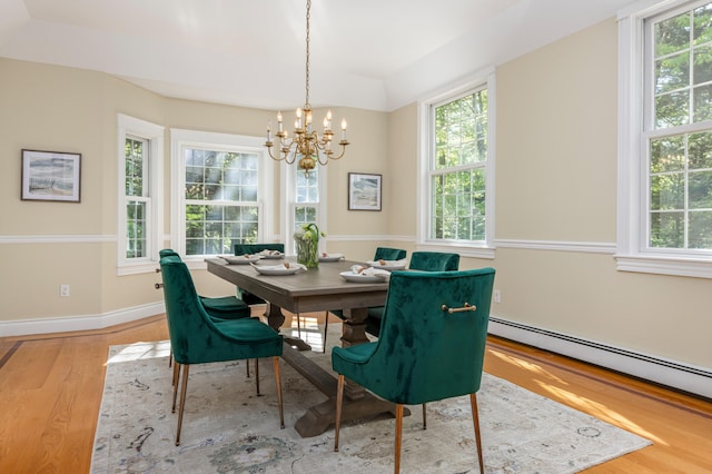 148 Hunter Way, Falmouth, ME 04105 - dining room featuring a chandelier, wood finished floors, a baseboard heating unit, and baseboards