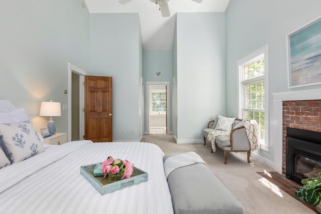 148 Hunter Way, Falmouth, ME 04105 - carpeted bedroom with a high ceiling, baseboards, a brick fireplace, and ensuite bathroom