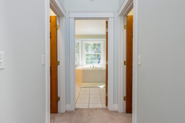 148 Hunter Way, Falmouth, ME 04105 - hall with light colored carpet and light tile patterned floors