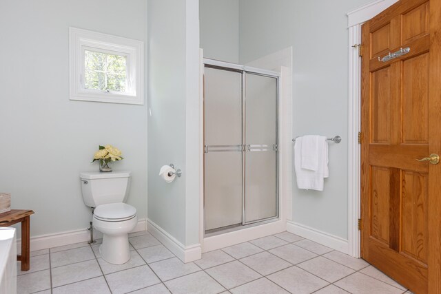 148 Hunter Way, Falmouth, ME 04105 - full bath featuring a stall shower, tile patterned floors, baseboards, and toilet