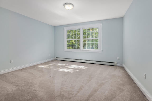 148 Hunter Way, Falmouth, ME 04105 - carpeted spare room with a baseboard heating unit and baseboards