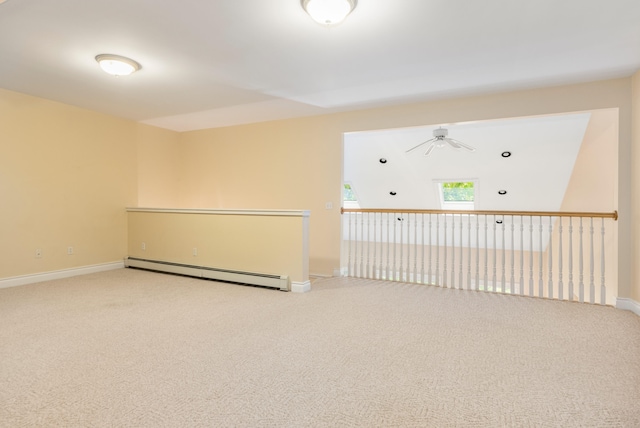 148 Hunter Way, Falmouth, ME 04105 - carpeted empty room featuring a baseboard heating unit, baseboards, and a ceiling fan