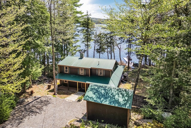 129 Diller Line Rd, Chesterville, ME 04938 - back of property with metal roof and a chimney