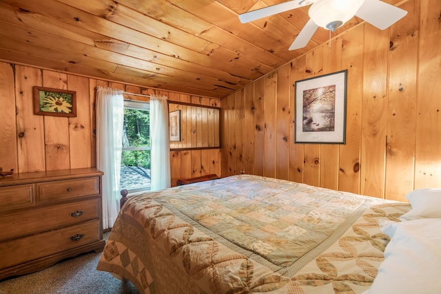 129 Diller Line Rd, Chesterville, ME 04938 - bedroom featuring wooden walls, wooden ceiling, lofted ceiling, and carpet floors