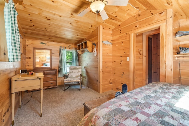 129 Diller Line Rd, Chesterville, ME 04938 - bedroom with lofted ceiling, wooden walls, wooden ceiling, and carpet floors