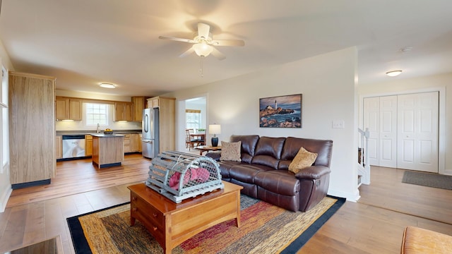 48 Lubear Way, Auburn, ME 04210 - living area featuring a ceiling fan, light wood-type flooring, and baseboards