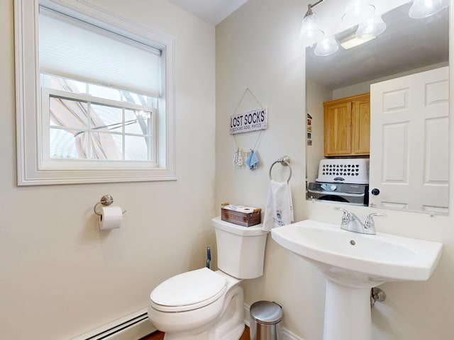 48 Lubear Way, Auburn, ME 04210 - bathroom featuring baseboard heating, toilet, and baseboards