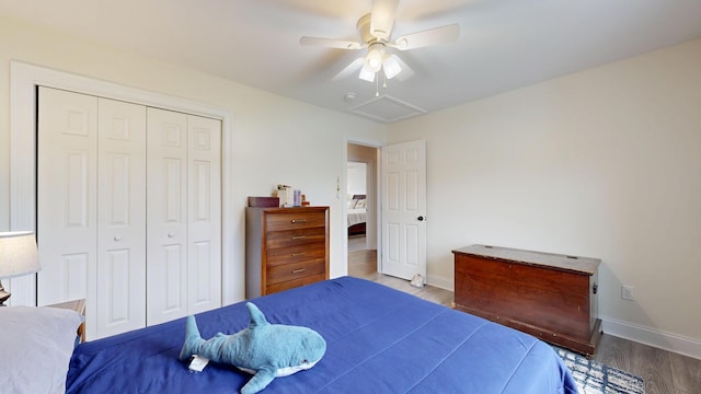 48 Lubear Way, Auburn, ME 04210 - bedroom featuring wood finished floors, baseboards, a closet, and a ceiling fan