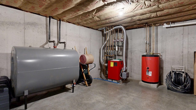 48 Lubear Way, Auburn, ME 04210 - utility room featuring gas water heater and oil tank