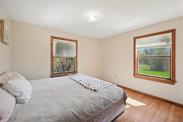 128 Capen Rd, Gardiner, ME 04345 - bedroom featuring baseboards and light wood-type flooring