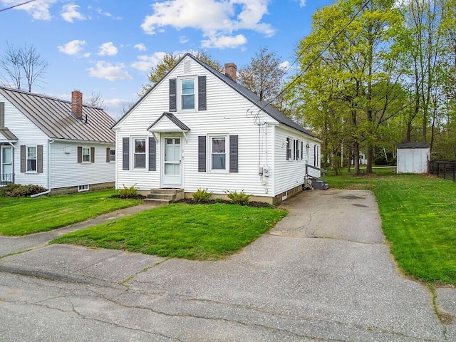 19 Fourth Ave, Augusta, ME 04330 - view of front of house featuring a chimney and a front yard
