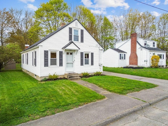 19 Fourth Ave, Augusta, ME 04330 - bungalow-style house with a chimney and a front lawn