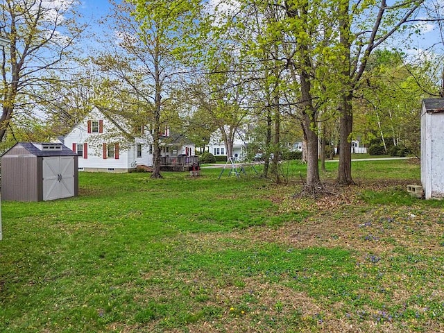 19 Fourth Ave, Augusta, ME 04330 - view of grassy yard featuring a shed and an outdoor structure