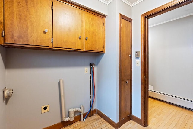 19 Fourth Ave, Augusta, ME 04330 - laundry area featuring hookup for an electric dryer, light wood finished floors, cabinet space, ornamental molding, and baseboard heating