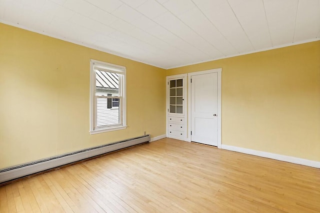19 Fourth Ave, Augusta, ME 04330 - unfurnished room with a baseboard radiator, light wood-style floors, and baseboards