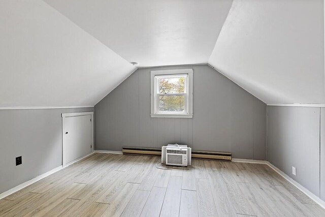 19 Fourth Ave, Augusta, ME 04330 - bonus room featuring wood finished floors, a baseboard radiator, vaulted ceiling, and baseboards