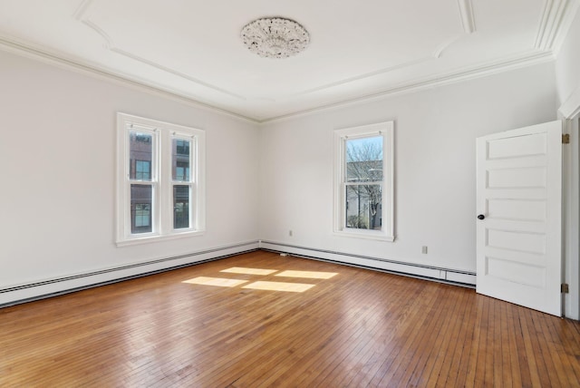 139 Newbury St, Portland, ME 04101 - spare room featuring ornamental molding, baseboard heating, and wood-type flooring