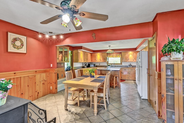 701 Augusta Rd, Winslow, ME 04901 - dining space featuring wainscoting and a ceiling fan