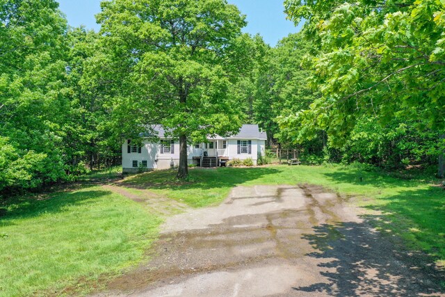349 Veterans Hwy, Brooks, ME 04921 - view of front of home with driveway and a front lawn