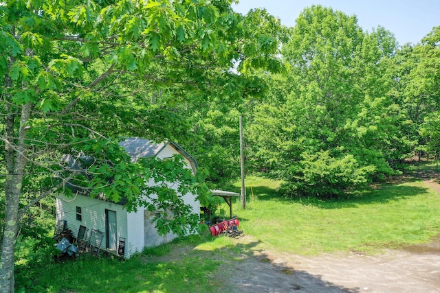 349 Veterans Hwy, Brooks, ME 04921 - view of yard featuring dirt driveway