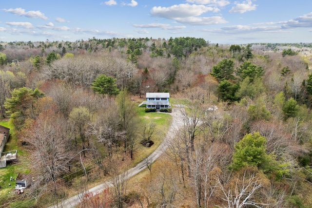 view from above of property featuring a forest
