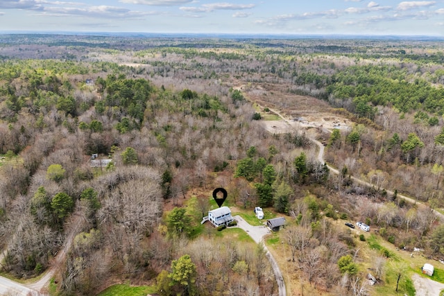 aerial overview of property's location with a forest
